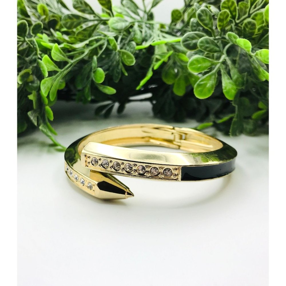 Bracelet bangle gold tone with black accent and rhinestones one pearl open ends